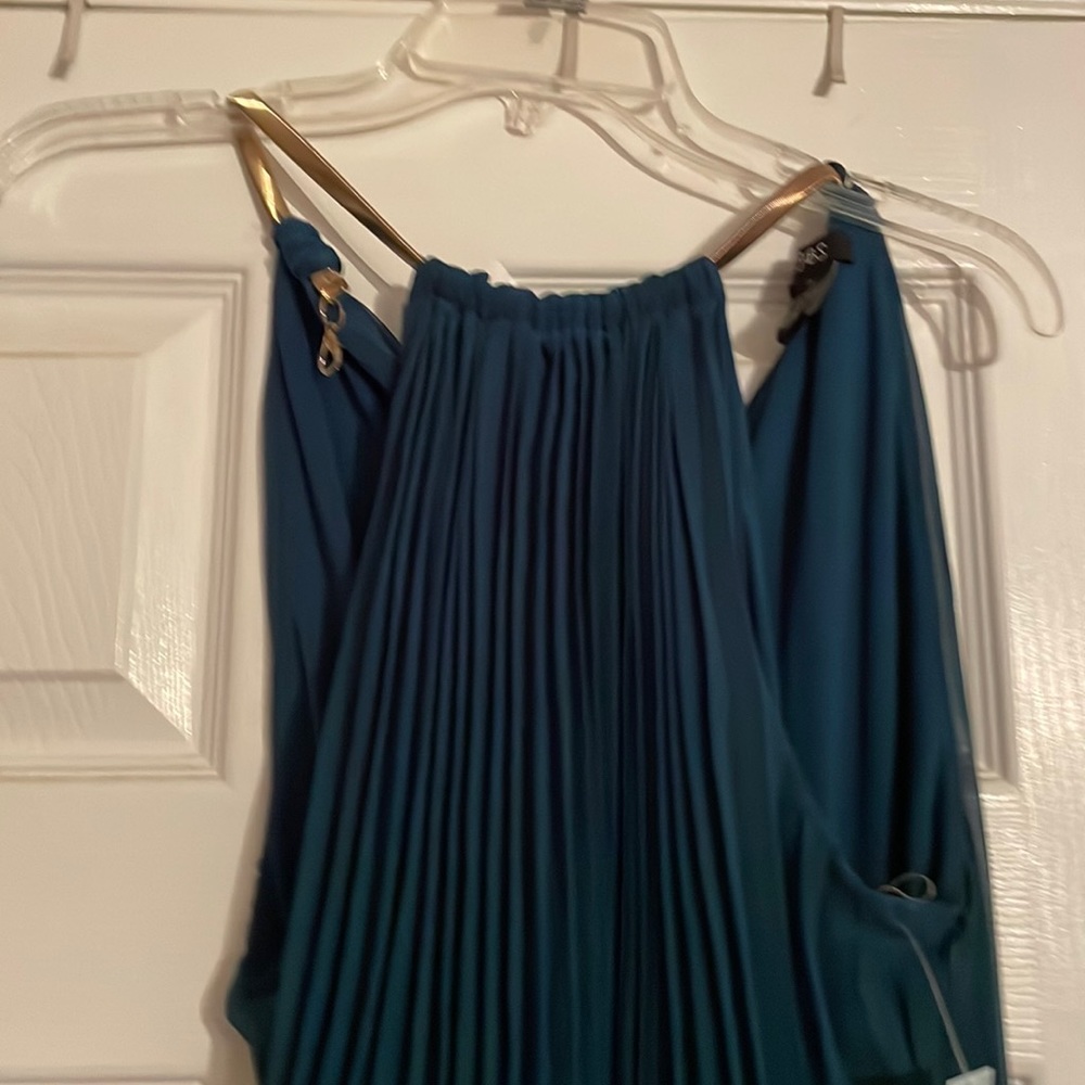 Beautiful long formal dress. Never worn.